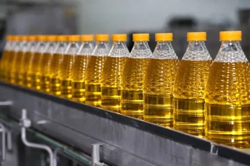Edible oil and viscous liquid filling line with capping labeling and case packing
