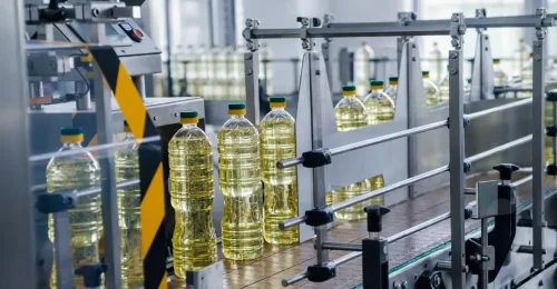 Edible oil and viscous liquid filling line scene for PET and glass bottles