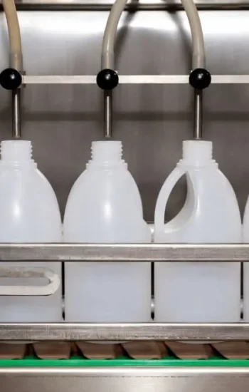 Integrated liquid fertilizer and daily chemical filling line with capping labeling and end-of-line packaging