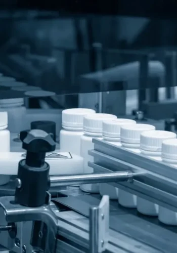 Integrated pharmaceutical bottling line with rinsing filling capping drying labeling and packing